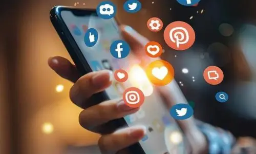 Digital Marketing Strategist In Kannur Using Social Media Apps On A Mobile Phone